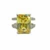rign with rectangular-cut yellow gemstone