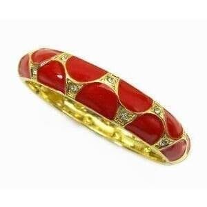 golden bracelet with large red circular inlays
