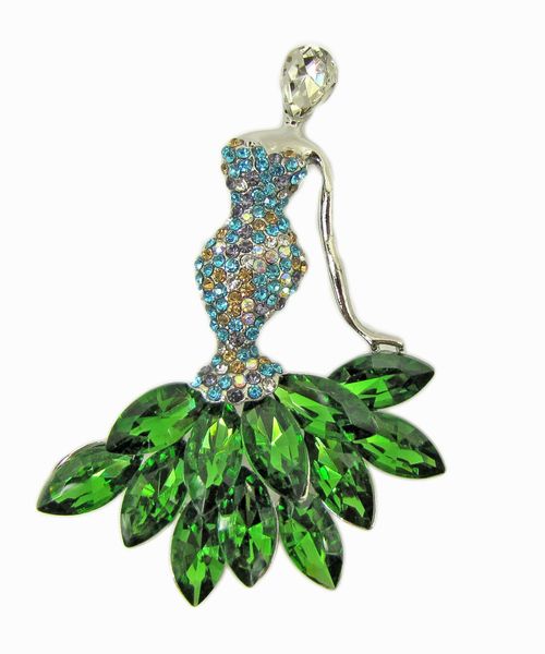 jewelry shaped like a woman with green gems