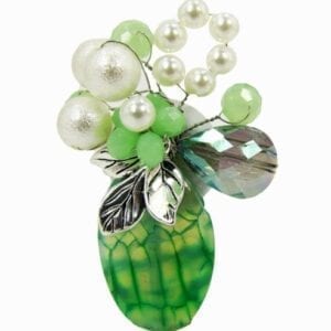green brooch with pearls and crystals