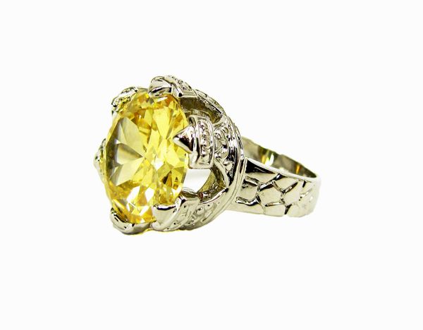 A large round yellow cubic zirconia ring