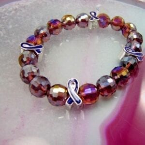 multicolored bracelet with black ribbons