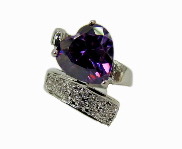 ring with violet heart gem