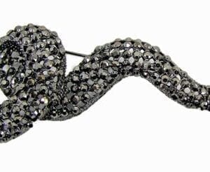 snake jewelry encrusted with black crystals