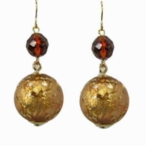earrings with large, spherical golden pendants
