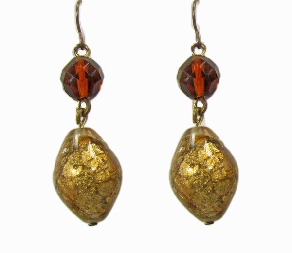 earrings with large golden pendants