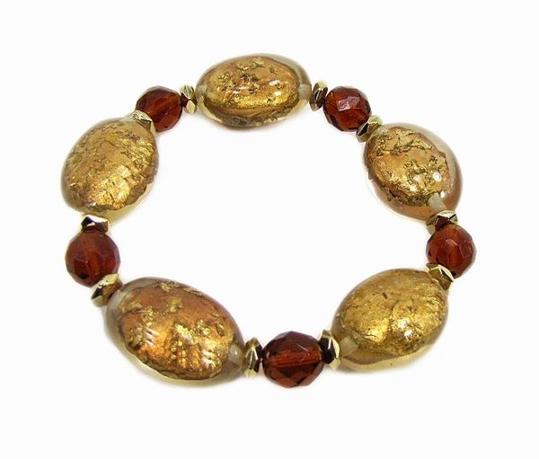 bracelet with large golden beads and red gems