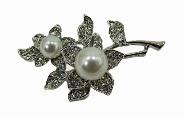 silver brooch with two pearls