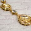 GOLD AND CLEAR CRYSTAL NECKLACE AND EARRING SET - Image 3
