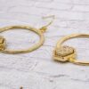 GOLD HOOP EARRINGS WITH GOLD STONE ACCENT - Image 2