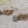 OPEN LATTICE LINK EARRINGS WITH BLUE GLASS BEAD - Image 6