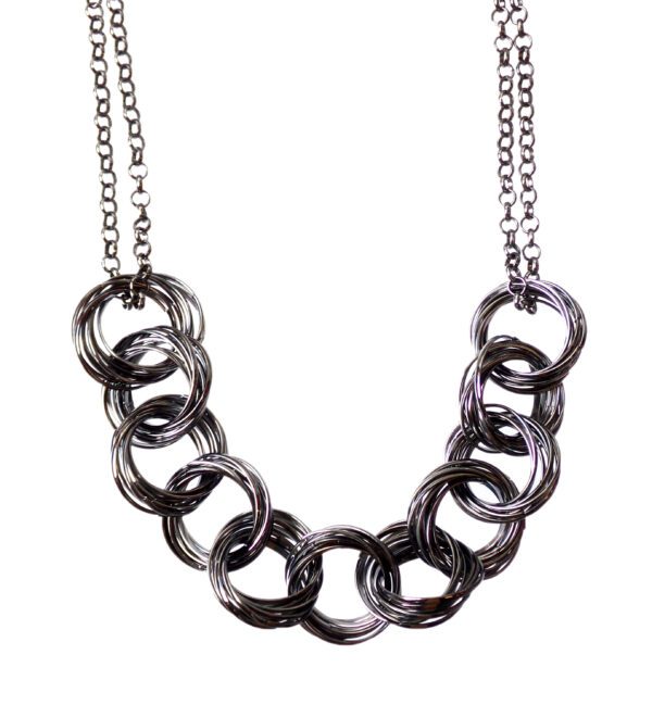 A large gray round link necklace jewelry