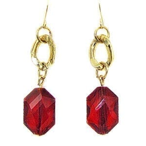 golden earrings with garnet gemstones