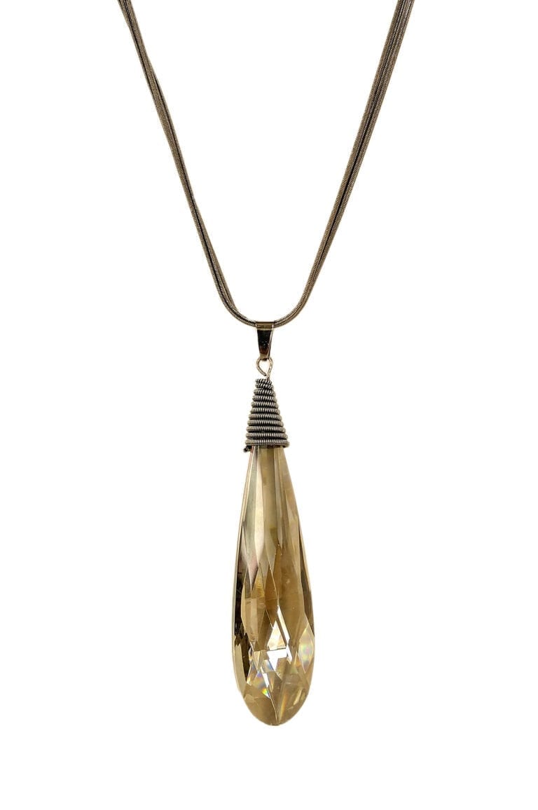 necklace pendant with elongated brown crystal
