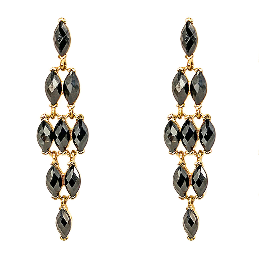earrings with black crystals arranged in a diamond shape