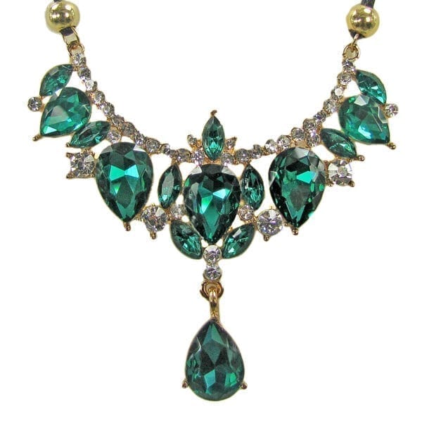 necklace pendant with emerald gems in an elaborate design
