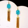 LIGHT BLUE GLASS BEAD EARRINGS WITH GOLD TASSEL - Image 2