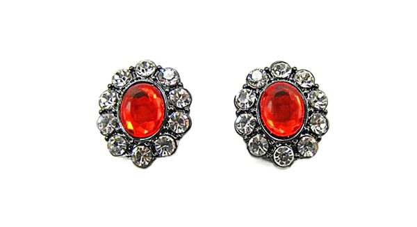 side view of earrings with large oval orange gems