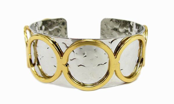 silver bracelet with golden circle design