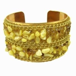 golden bracelet with pointy yellow crystals