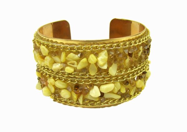 golden bracelet with pointy yellow crystals