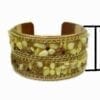 golden bracelet with pointy yellow gemstones and text for dimensions