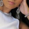 woman wearing bracelet and necklace with silver beads