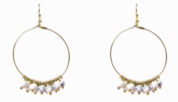 circular earrings with solid white beads