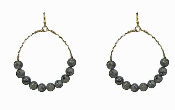 earrings with rows of dark stones