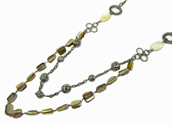 layered necklace with silver beads and olive green stones