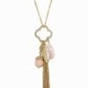 clover leaf pendant design with brown and pink stone attachments