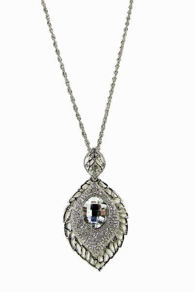 silver necklace pendant with dark crystal inset