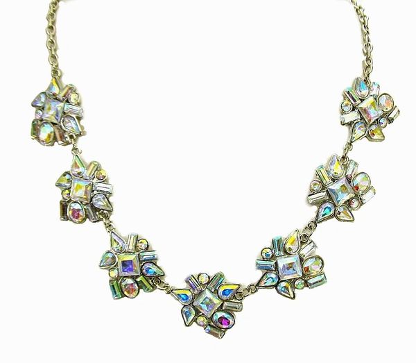 necklace with rows of metallic gems in clusters