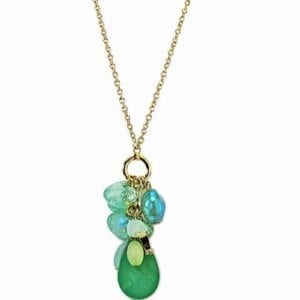 necklace pendant with clusters of green stones and crystals