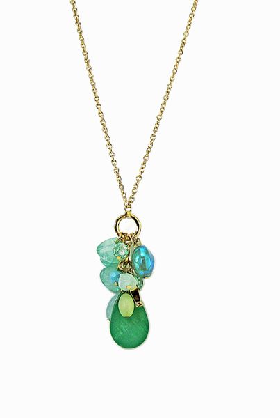 necklace pendant with clusters of green stones and crystals