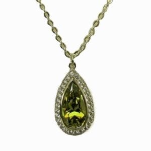 necklace pendant with yellow green gem inset