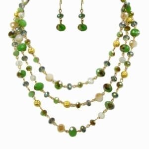 earrings and layered necklace with green and yellow gems