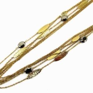 Layers of gold and black diamond glass necklace