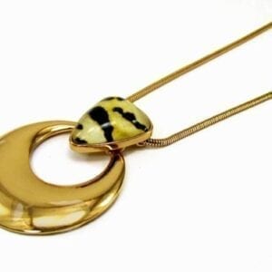 necklace with animal print pendant and gold hoop attachment
