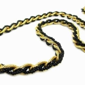 twisted necklace with gold chain and black pearls