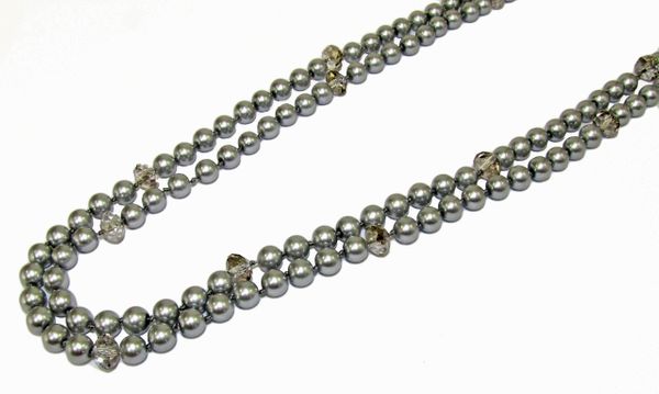 segment of necklace with silvery metal beads