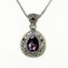 necklace pendant with dark teardrop gemstone