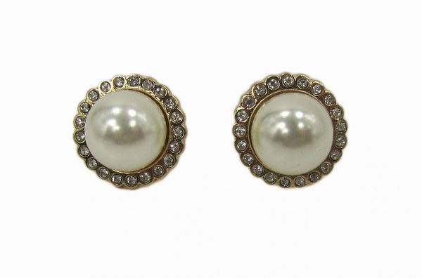 earrings with pearls surrounded by white crystals