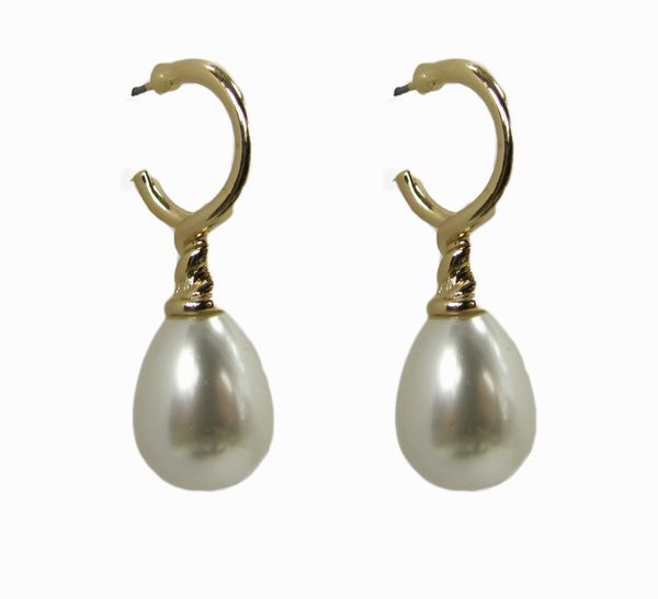 earrings with teardrop pearl hanging on a golden hook