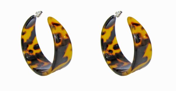 c-shaped earrings with animal print design