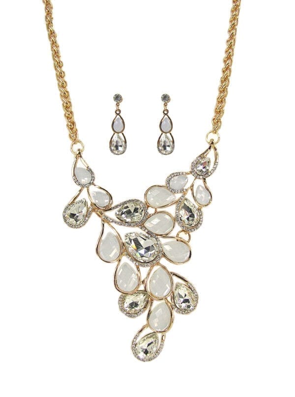 necklace and earrings with pearl and diamond gems arranged like vines
