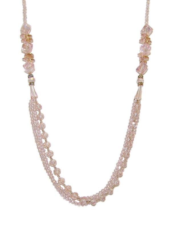 segment of a layered necklace with pink crystals