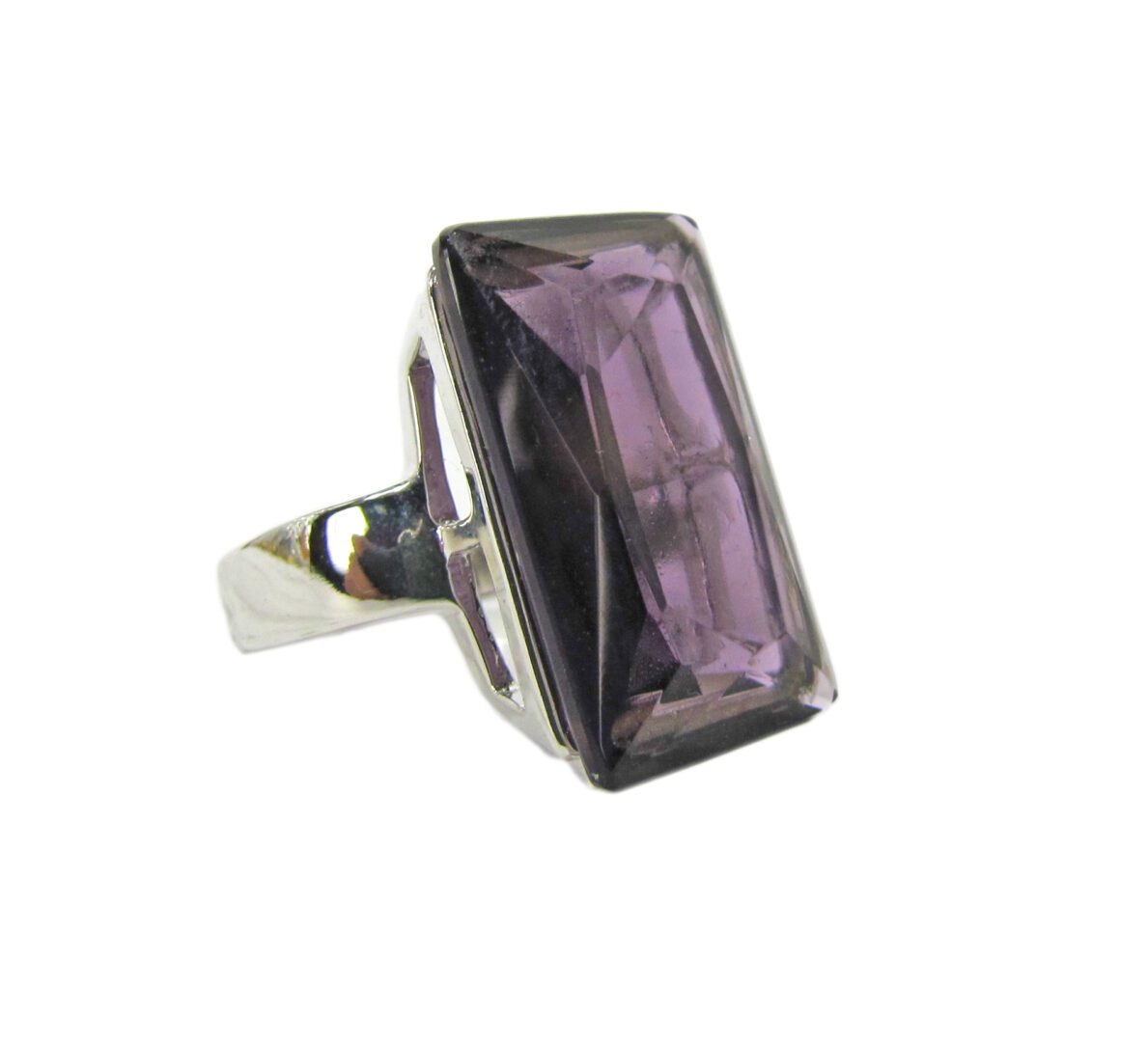 side view of a ring with square cut violet gem