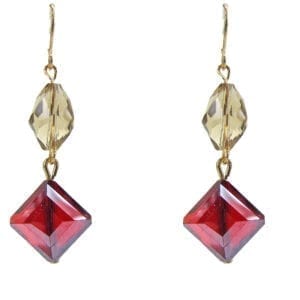 earrings with pale yellow and red gemstones