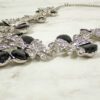 BLACK & CLEAR CRYSTAL STATEMENT NECKLACE WITH FLOWER STATIONS - Image 8